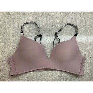 LOVESECRET Bra. Beige Size M. Preowned In excellent condition. Design on straps.